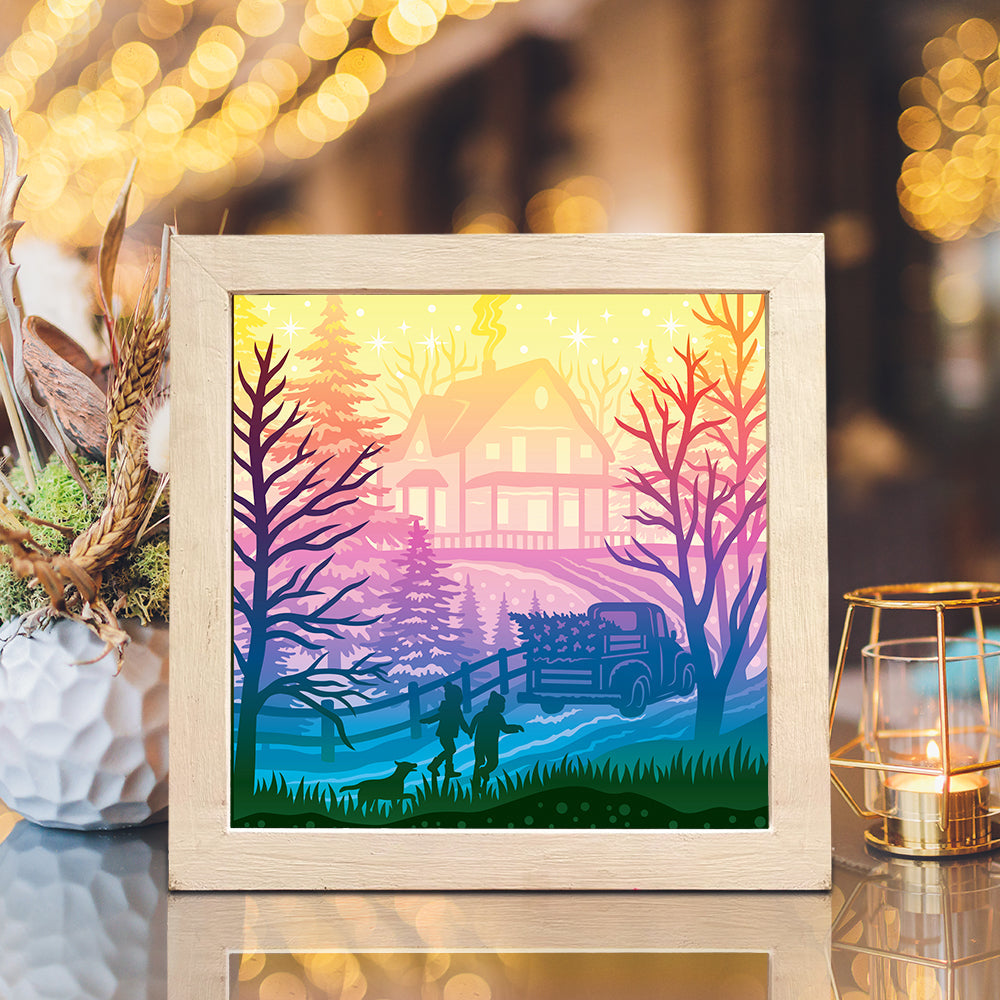 Christmas forest 3D paper cut light box glowing in a dark room